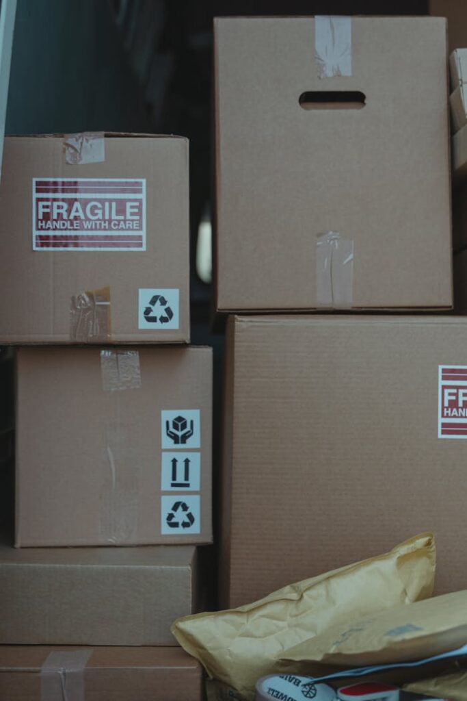 pexels-photo-6169674 Cardboard boxes with fragile labels ready for shipping and storage solutions.